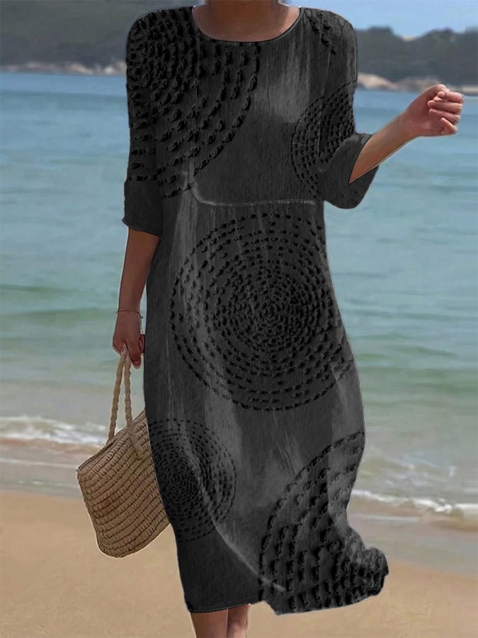 Robe midi élégante Améliane™ de Danoir Paris avec détails délicats, tissu blanc et coupe sophistiquée visible sur l'image.