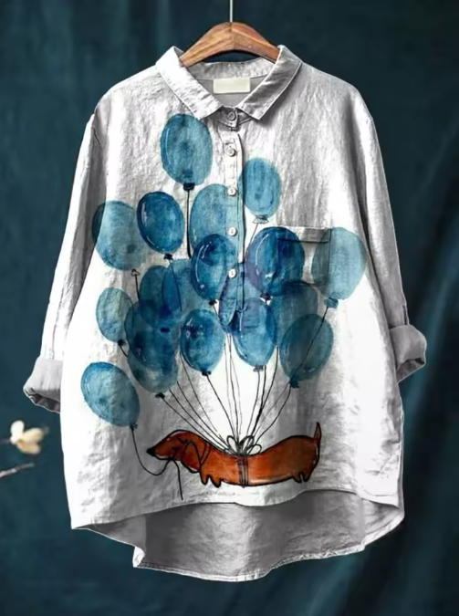 Blouse ballon Bowie de Danoir Paris avec motif artistique de teckel, en tissu blanc, style élégant et original.
