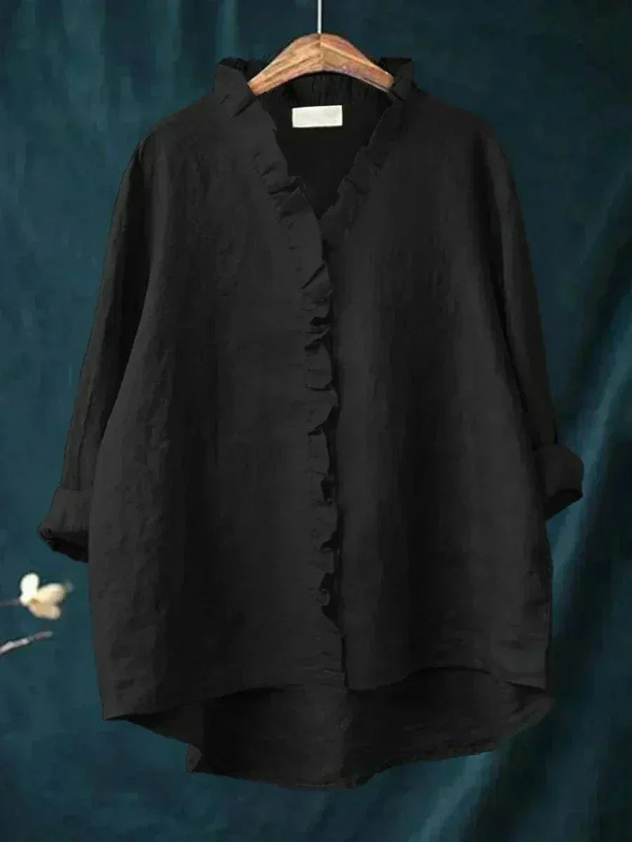 Blouse blanche Danoir Paris Célestine avec volants délicats, tissu léger et finition élégante pour un style féminin.