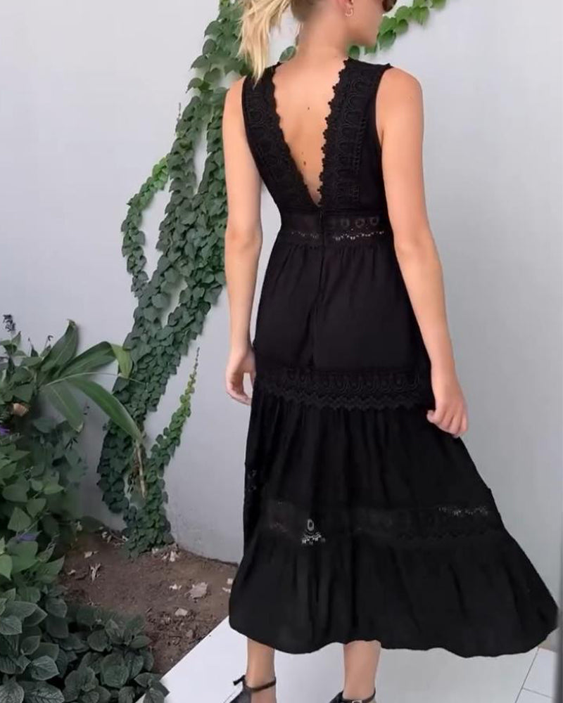 Robe élégante d'été Charlotte de Danoir Paris, en tissu blanc léger, avec détail de couture et coupe fluide.