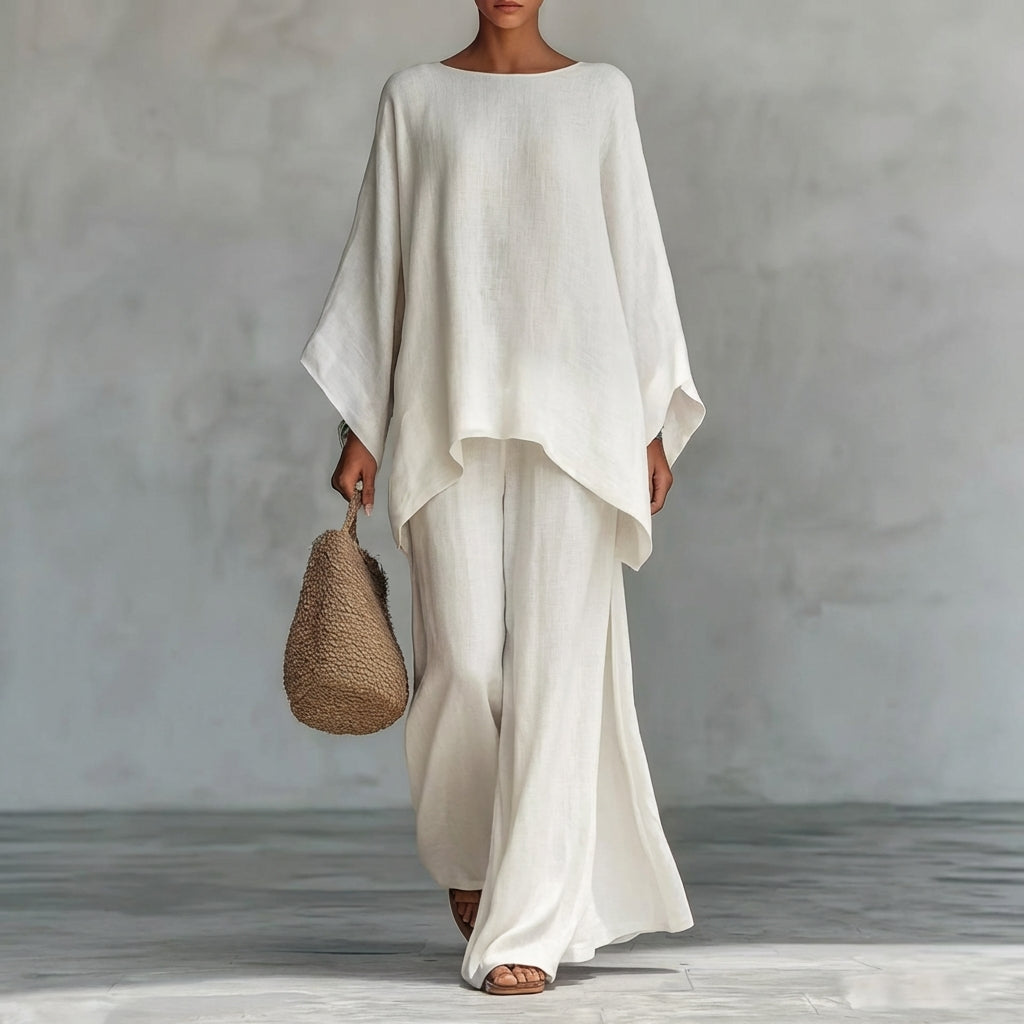 Ensemble deux pièces Danoir Paris Christine avec manches longues et pantalon large, en tissu blanc élégant.