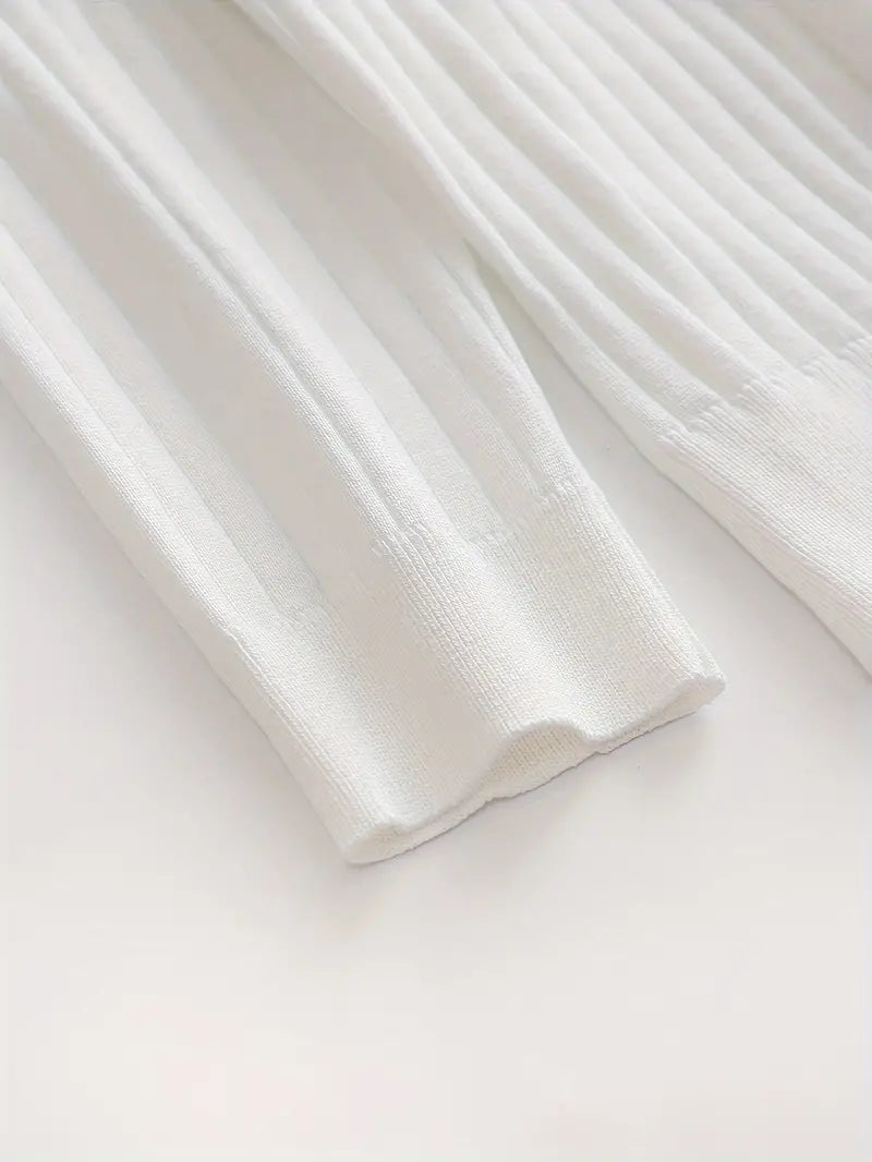 Pull texturé blanc Danoir Paris™ Sogno, douceur et style, affiché sur mannequin avec col rond et manches longues.