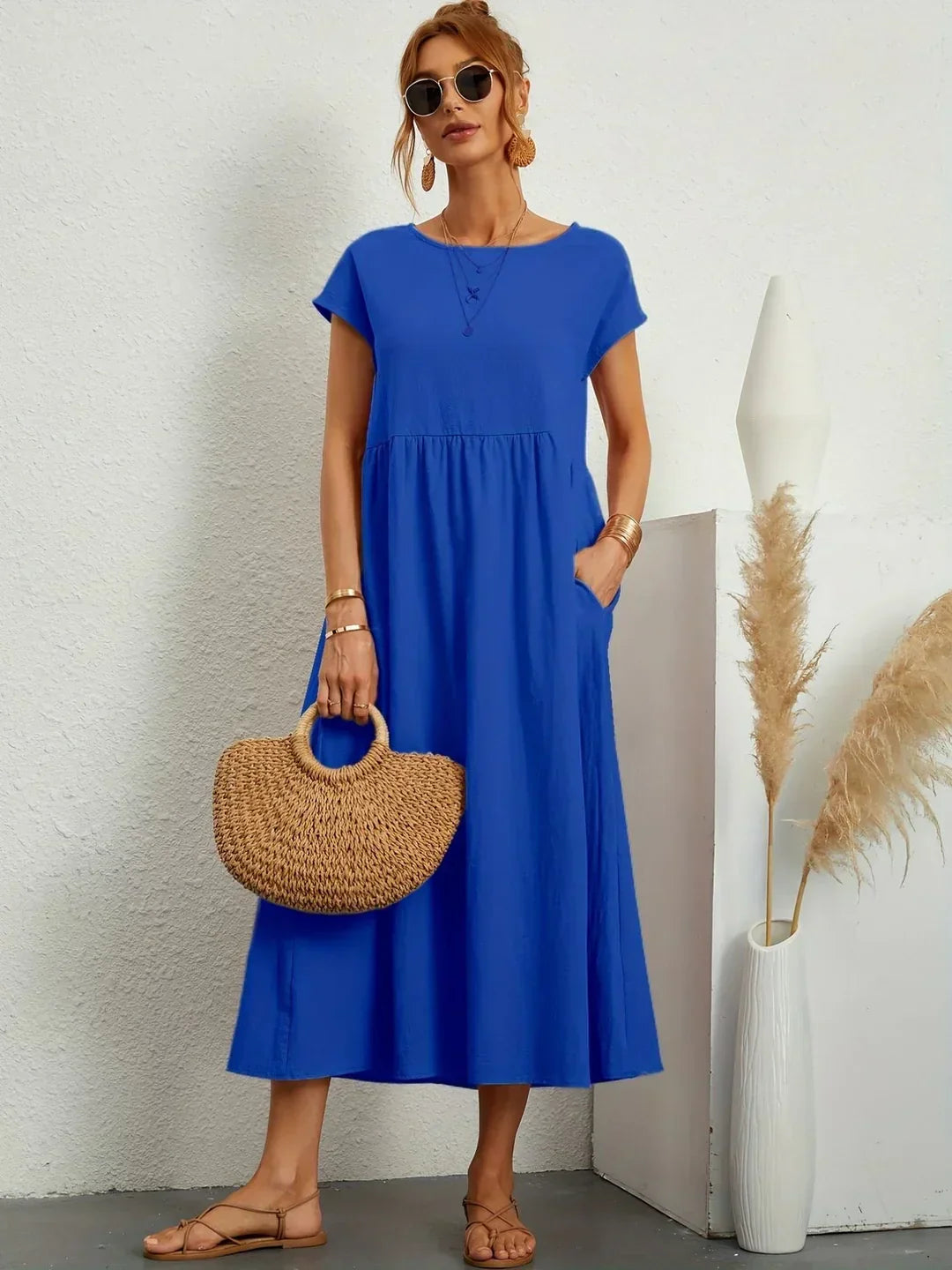 Robe midi fluide Gabrielle™ de Danoir Paris en tissu léger, élégance intemporelle, couleur blanche, vue sur le mannequin.