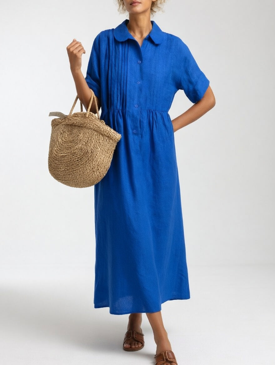 Robe chemise fluide estivale Lysandra™ de Danoir Paris, en tissu léger blanc avec détails élégants, vue de face.