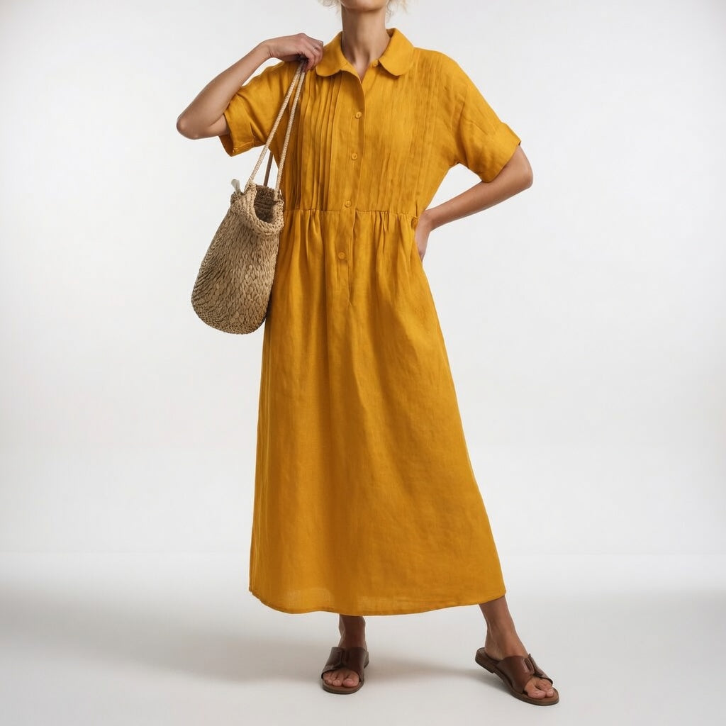Robe chemise fluide estivale Lysandra™ blanche par Danoir Paris portée, légère et élégante, parfaite pour l'été.