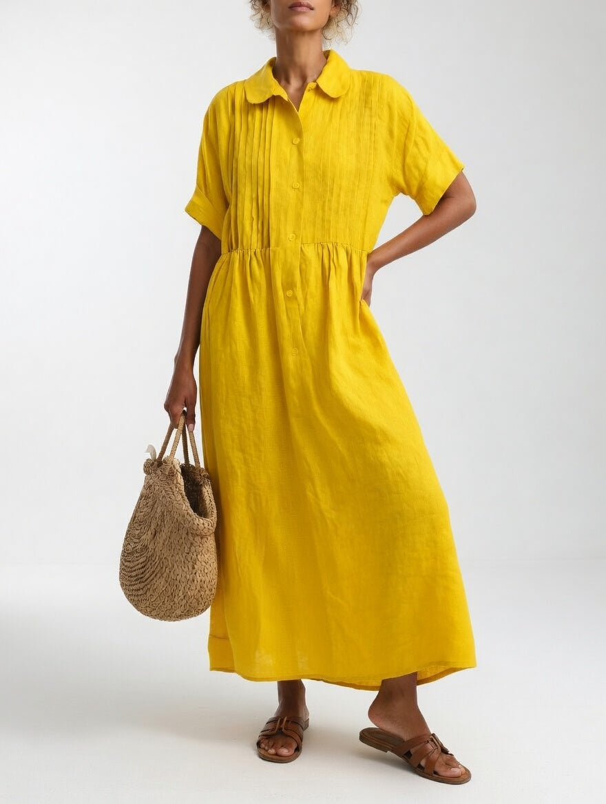 Robe chemise fluide estivale Lysandra™ de Danoir Paris, en tissu léger blanc, parfaite pour la saison chaude.