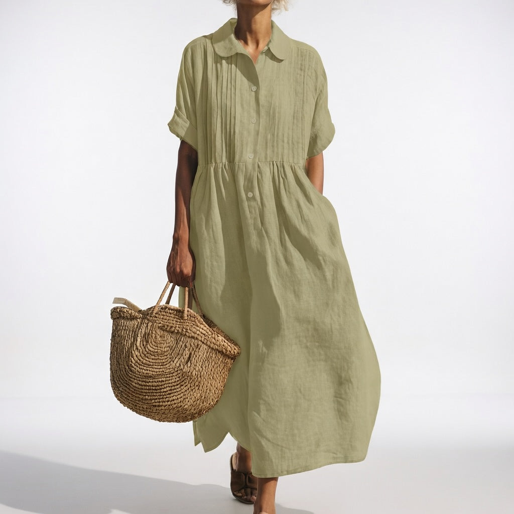 Robe chemise fluide d'été Lysandra™ de Danoir Paris, tissu léger blanc avec boutons et manches courtes.
