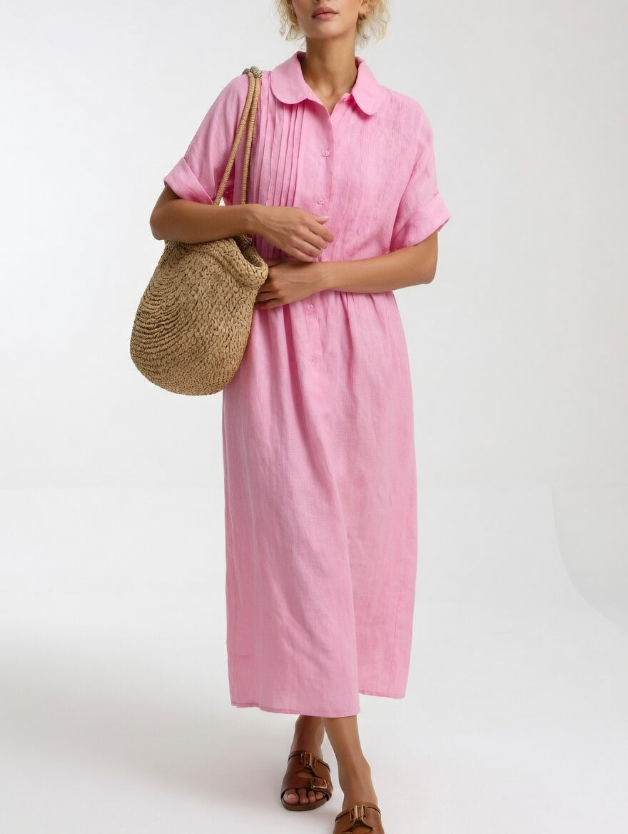Robe chemise fluide estivale Lysandra™ de Danoir Paris, tissu léger blanc, parfait pour la saison estivale.