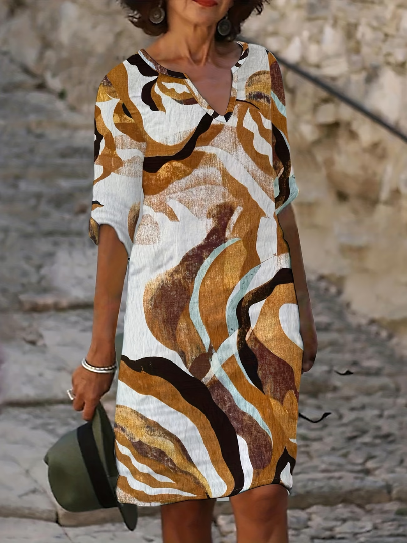 Robe d'été légère Danoir Paris Emma en tissu bleu, style fluide et confortable pour la saison estivale.