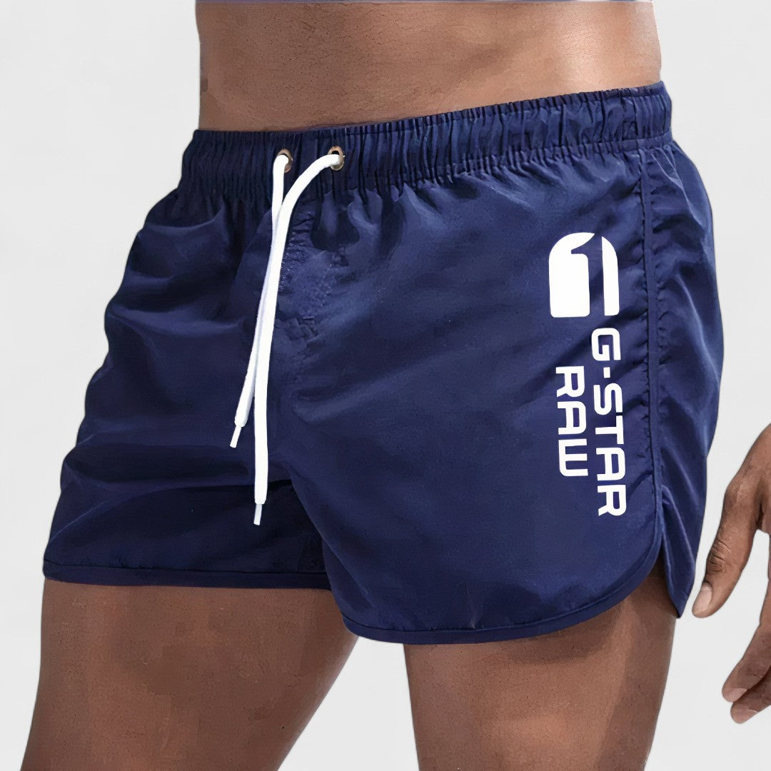 Short maillot de bain homme Laluna® Danoir Paris en bleu, style élégant et confortable pour la plage ou la piscine.