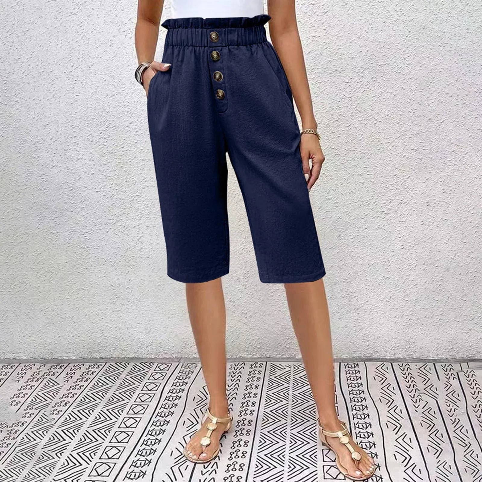 Shorts Bermuda boutonnés Éloane en lin-coton bleu bébé de Danoir Paris, tissu léger et confortable pour enfant.