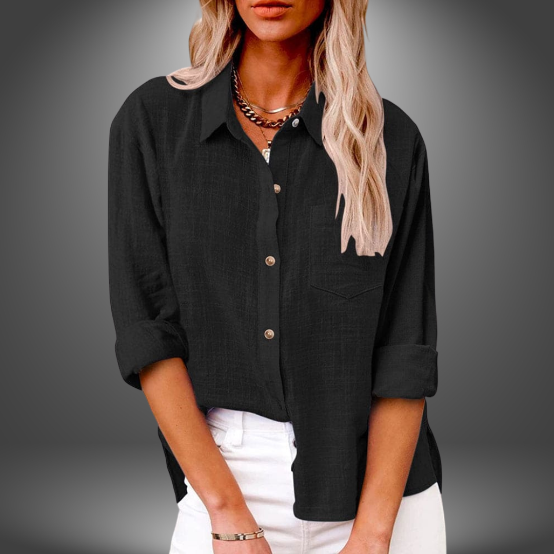 Blouse en lin premium Eve de Danoir Paris, couleur bleu clair, avec col et manches longues, tissu léger et élégant.