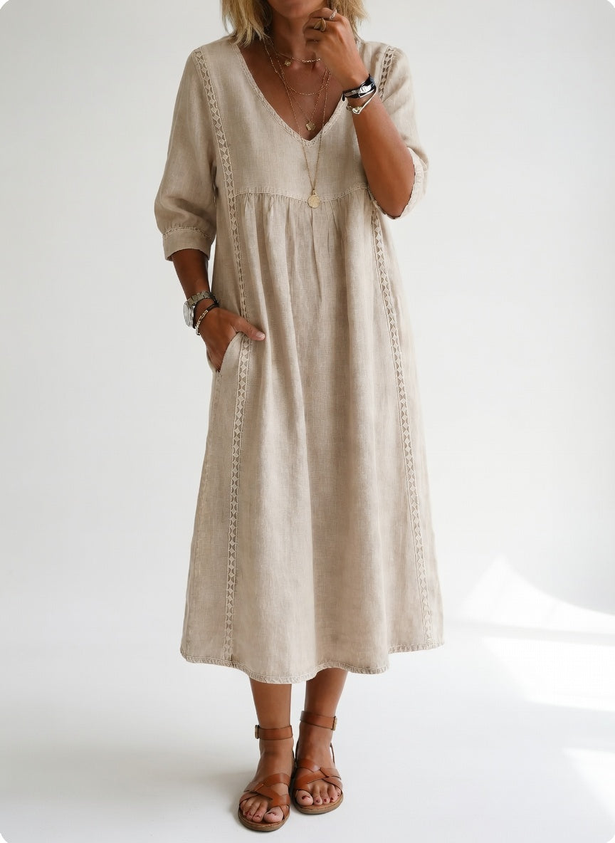 Robe midi fluide décontractée Danoir Paris Lioréa™ en tissu léger de couleur bleu clair, élégante et confortable.