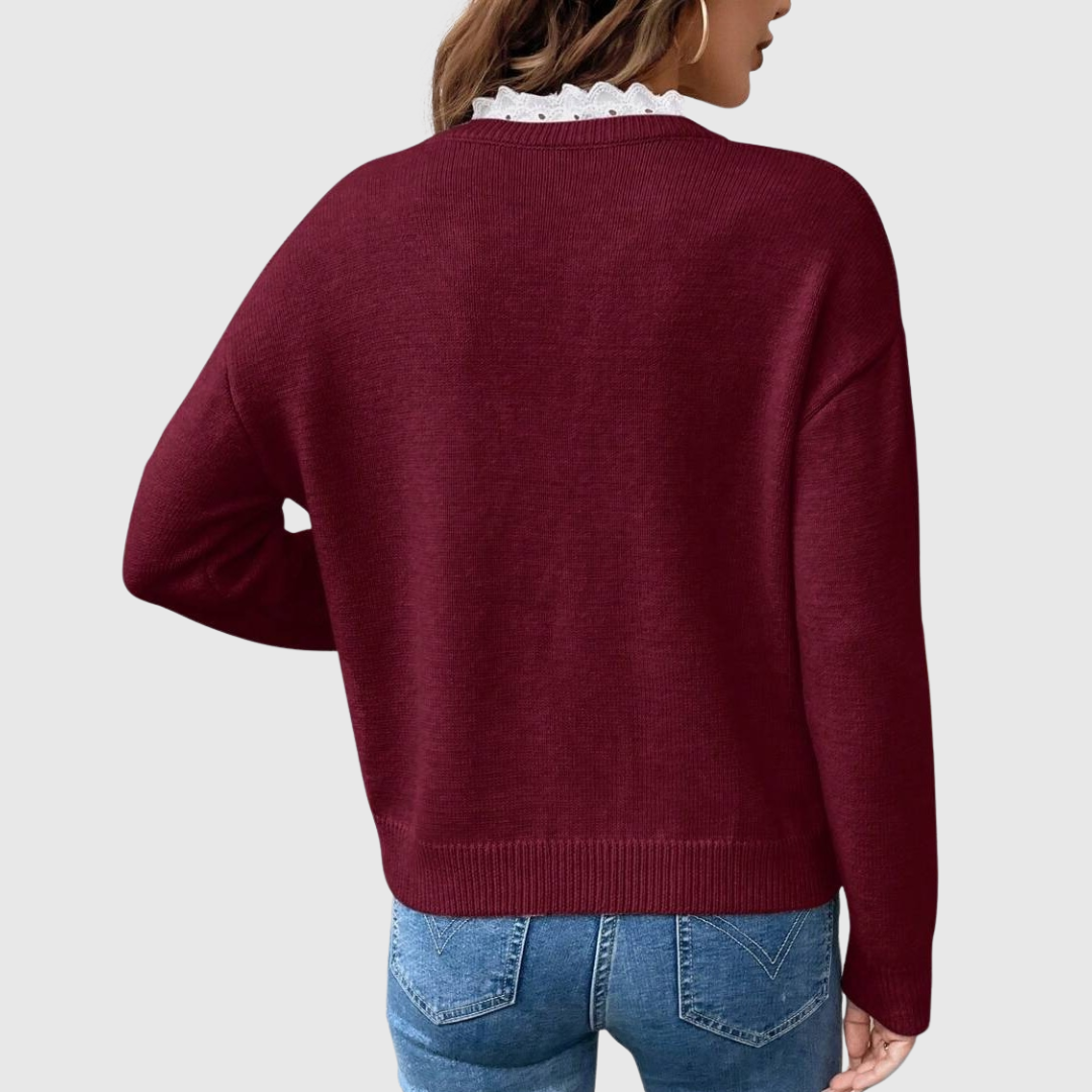 Top élégant Zaryphine de Danoir Paris, en tissu bleu foncé, avec détails sophistiqués et coupe flatteuse.