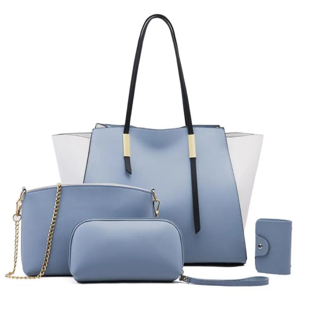 Ensemble de 4 sacs de shopping élégants et luxueux Danoir Paris, sacs en tissu bleu avec poignées.