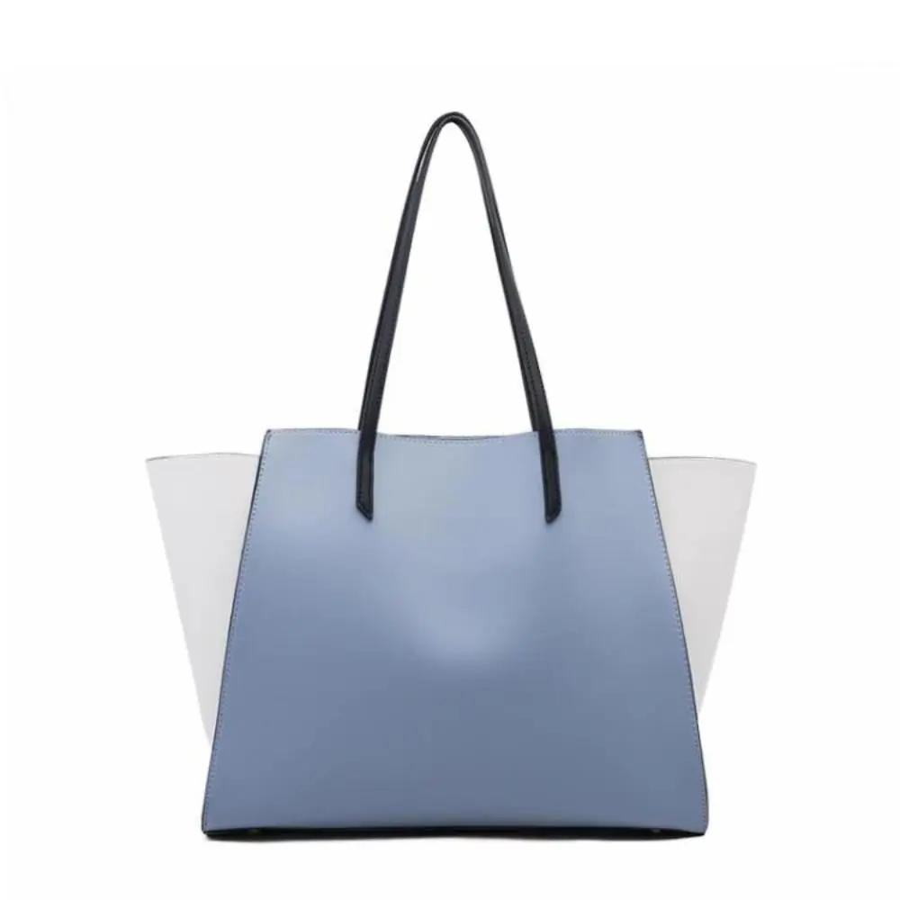 Ensemble de 4 sacs de shopping élégants et luxueux Danoir Paris, sacs en tissu bleu avec poignées.