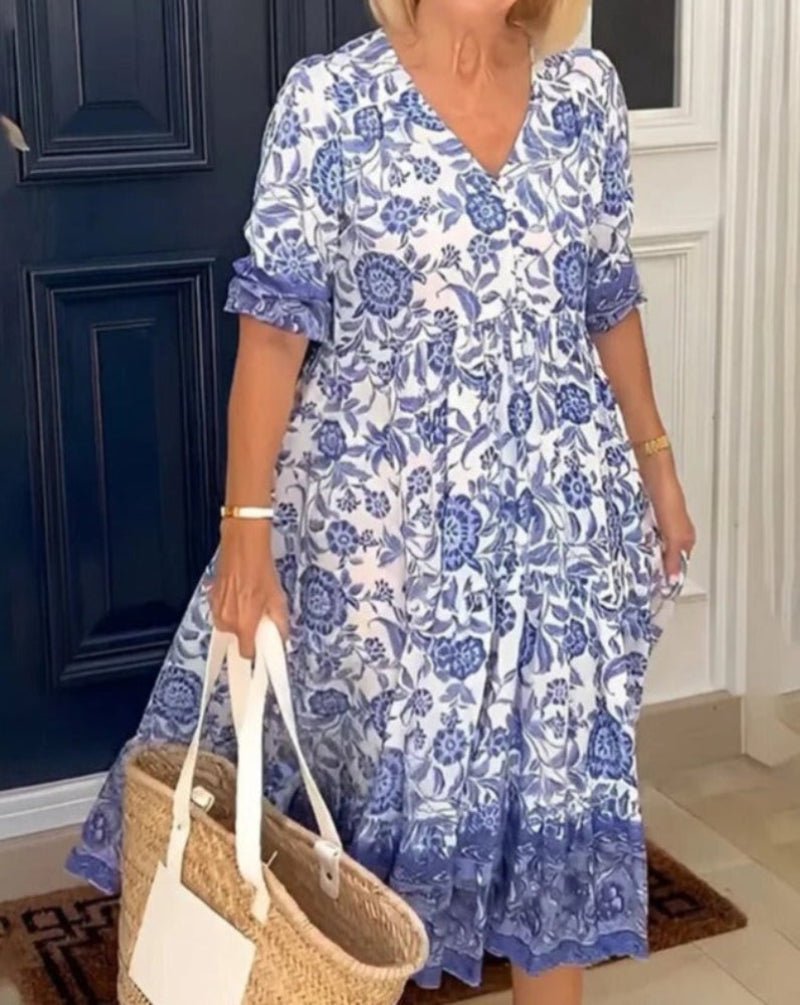 Robe d'été élégante Danoir Paris Manelle en tissu bleu, coupe fluide et sophistiquée, idéale pour la saison estivale.