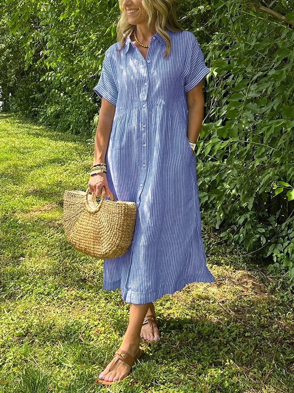 Robe maxi élégante Angela de Danoir Paris en tissu bleu, avec coupe fluide et détails sophistiqués pour une allure raffinée.