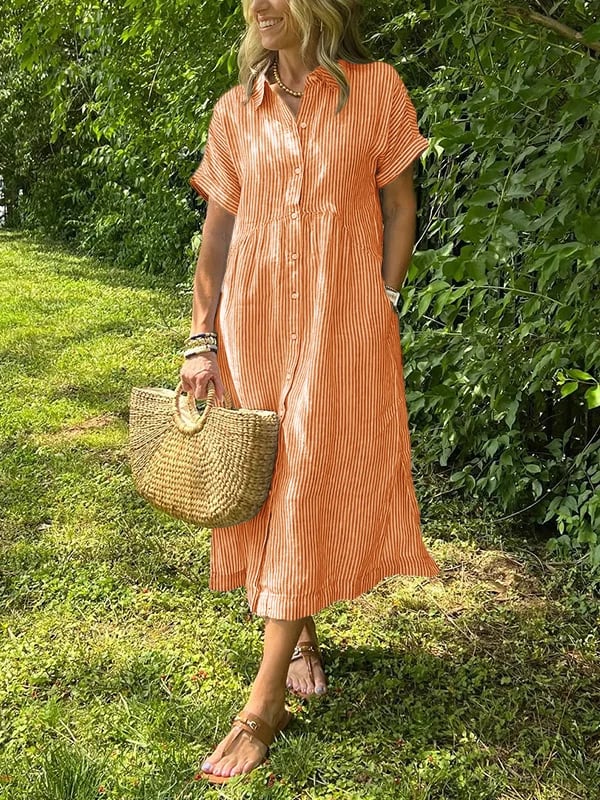 Robe maxi élégante Danoir Paris Angela en tissu bleu, vue de face avec détails sophistiqués.
