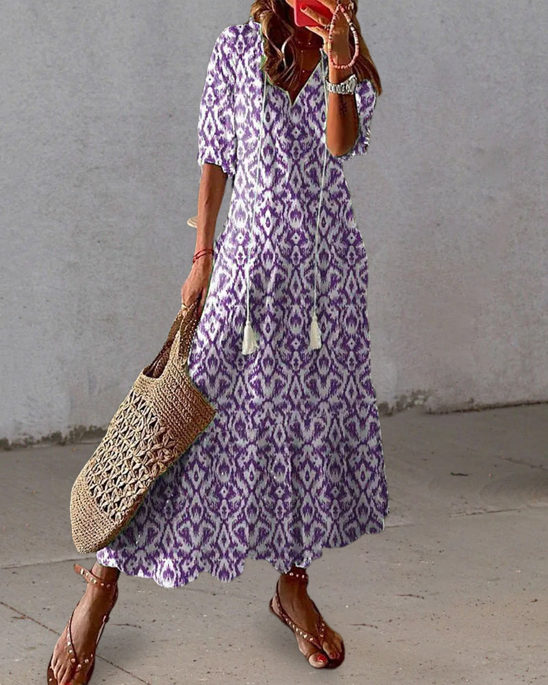 Robe bohémienne légère Dianna de Danoir Paris en tissu fluide bleu, détails élégants et style décontracté.