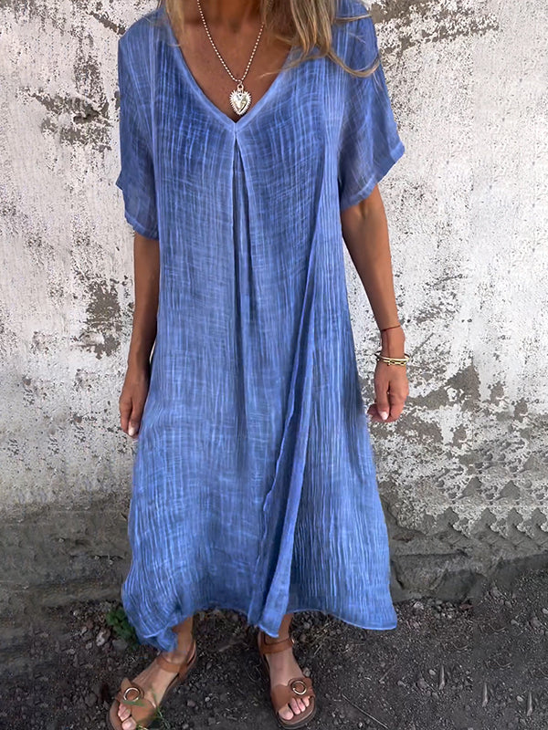 Robe écologique Malaga de Danoir Paris en tissu bleu, élégante et fluide, portée sur mannequin.