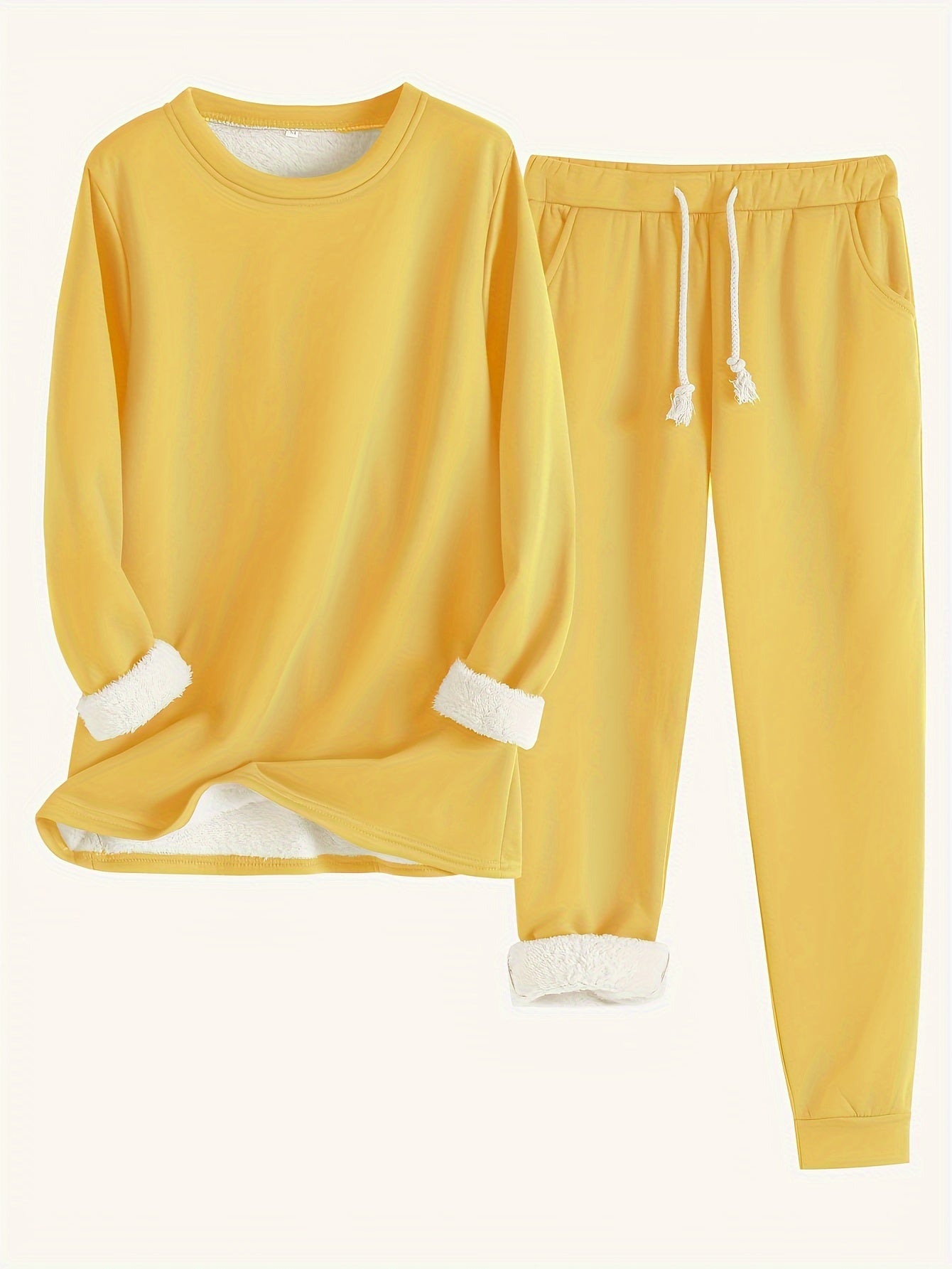 Ensemble de loungewear chic Rebecca de Danoir Paris, costume bleu confort et élégance pour la détente.