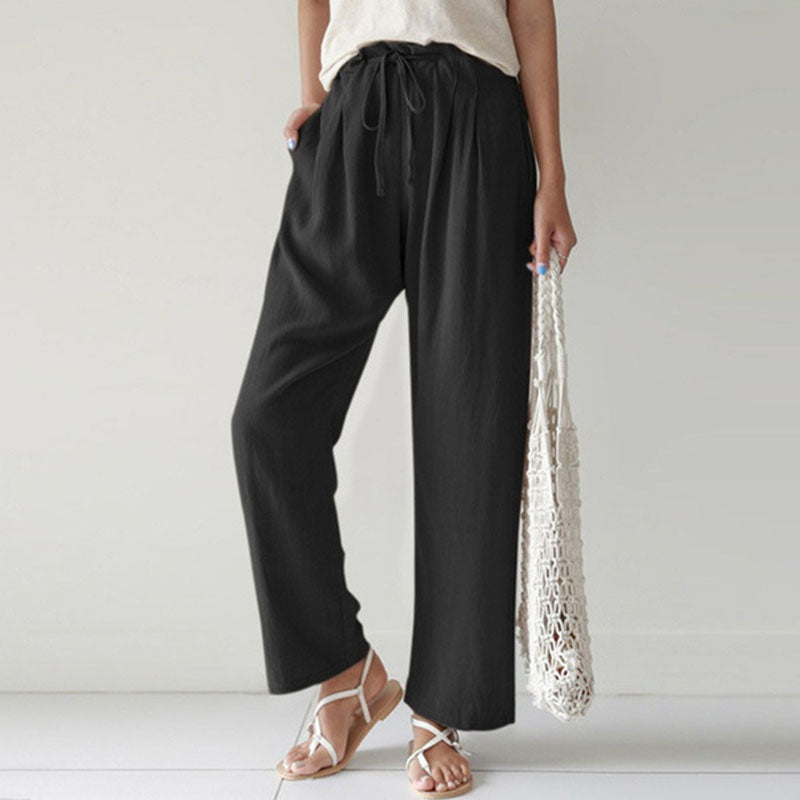 Pantalons relax Danoir Paris Vara en tissu bleu avec corde à taille, vue de face.
