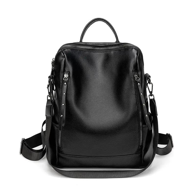 Sac à dos urbain chic Danoir Paris Sienna en tissu bleu avec poches zippées et détails élégants.
