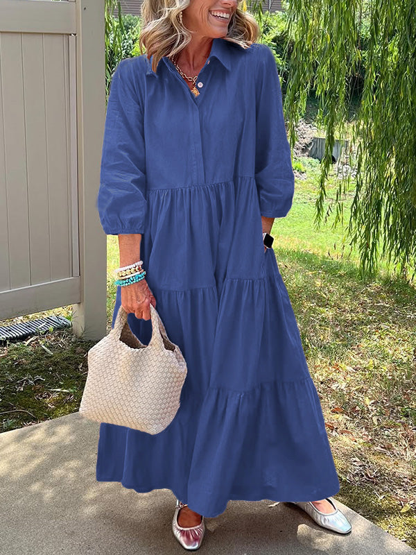 Robe maxi élégante Bente de Danoir Paris en tissu bleu, vue de face avec détails sophistiqués.
