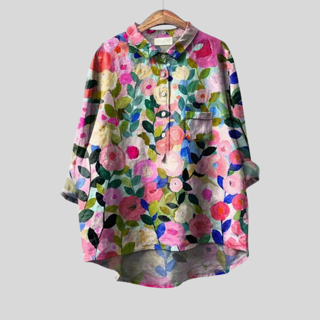 Blouse florale artistique Danoir Paris avec imprimé coloré, manches longues et coupe élégante, vue de face.