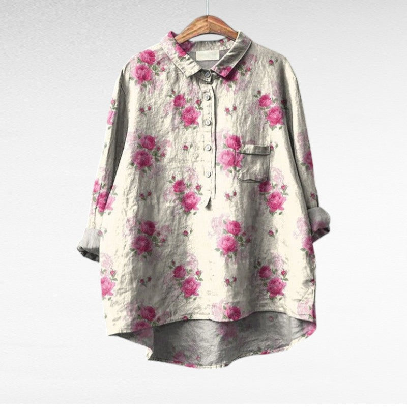 Blouse florale artistique Danoir Paris, tissu léger avec imprimé floral coloré, portée décontractée et élégante.