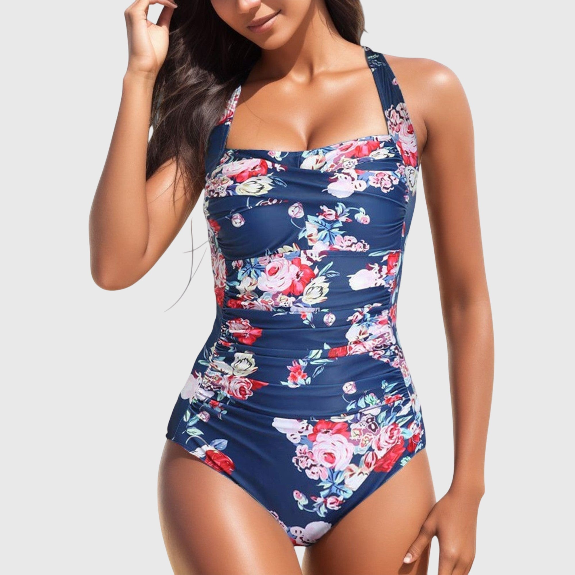Maillot une pièce Lina de Danoir Paris, bleu et rose, en taille XS, porté sur mannequin, détails du design élégant.