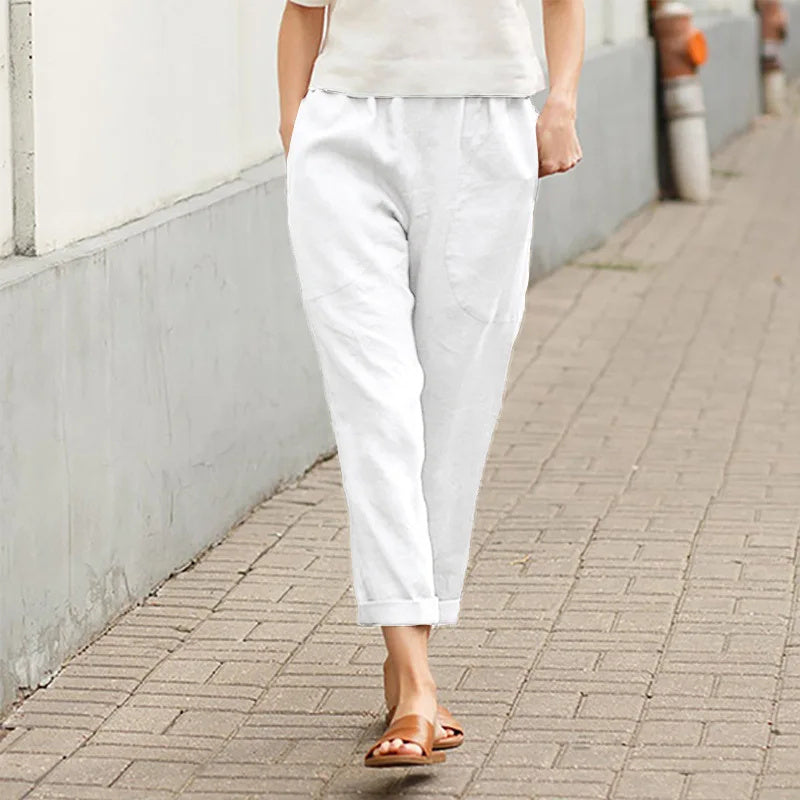 Pantalons amples blancs Danoir Paris Kriza avec poches, vêtement pour femmes, style confortable et décontracté.