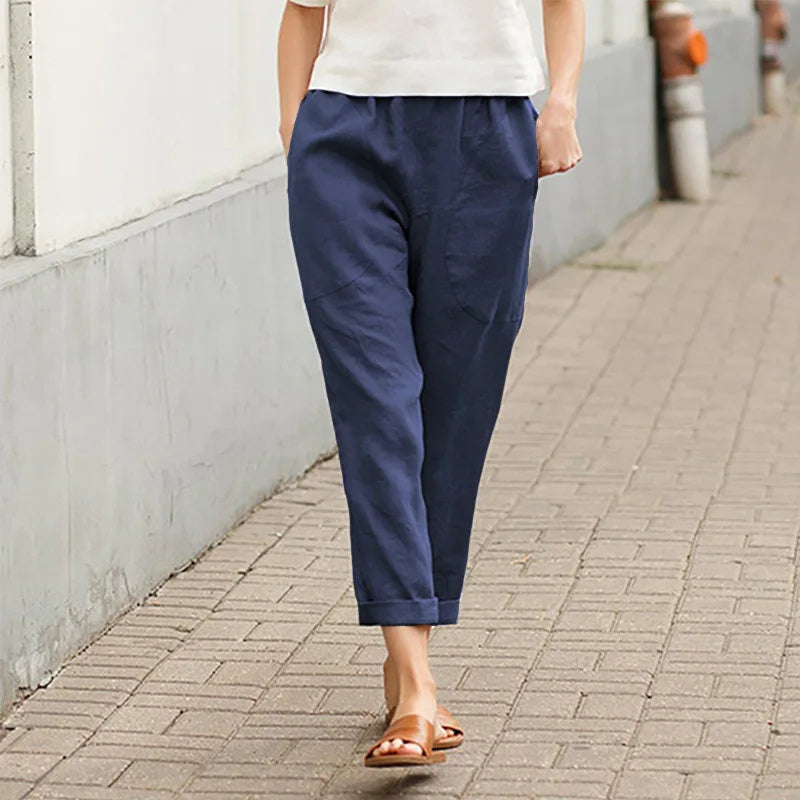 Pantalons amples blancs Kriza de Danoir Paris avec poches, mode décontractée pour femmes, vue de face.