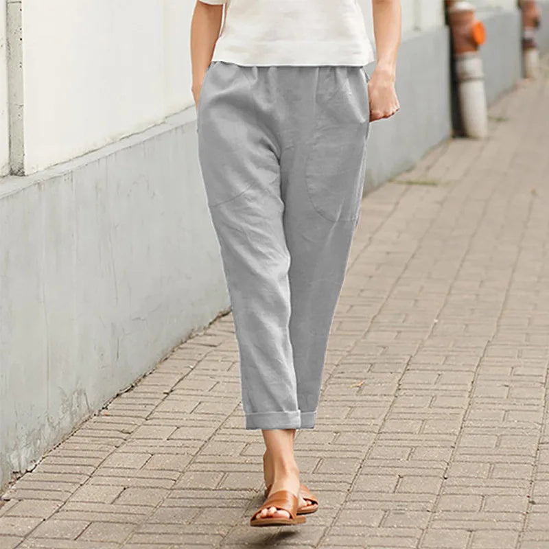 Pantalons amples blancs Kriza de Danoir Paris avec poches, vêtement de style décontracté et confortable.