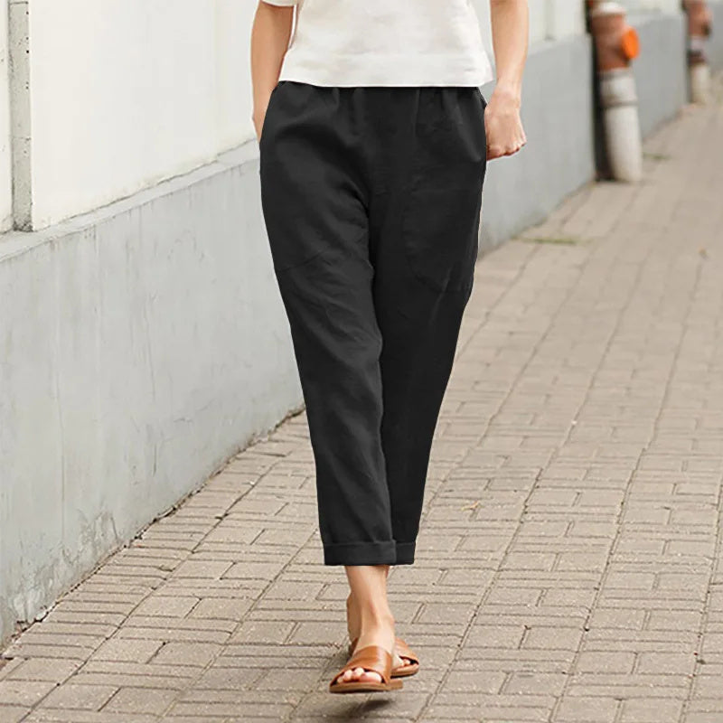 Pantalons amples blancs Kriza de Danoir Paris avec poches, vêtement confortable pour femme.