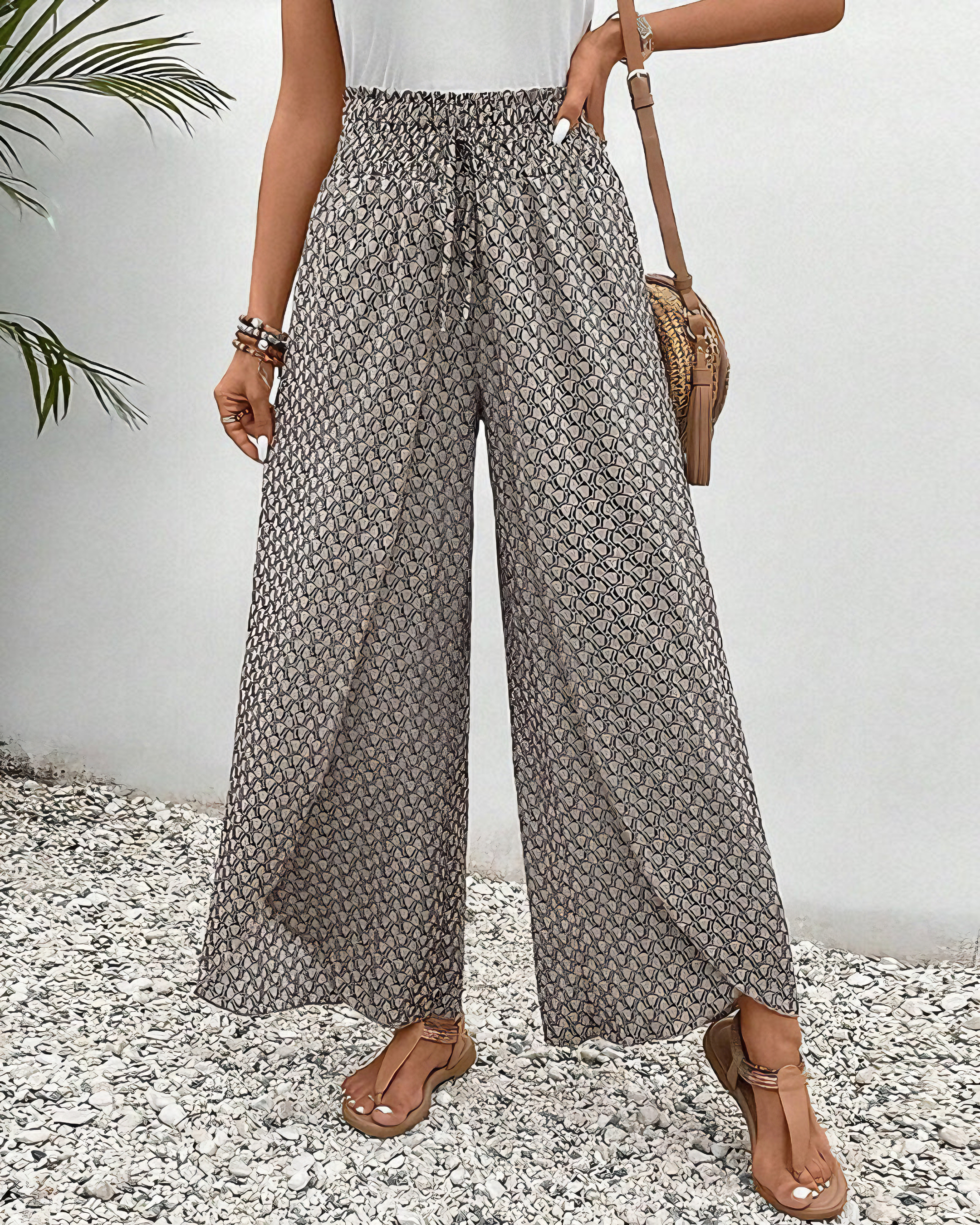Pantalon large relax Danoir Paris Sahara, vêtement pour le bas, en tissu léger, en couleur neutre, image montrant le pantalon porté.