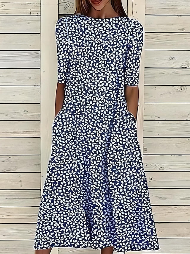 Robe d'été élégante Danoir Paris en bleu, coupe fluide et légère, parfaite pour la saison estivale.