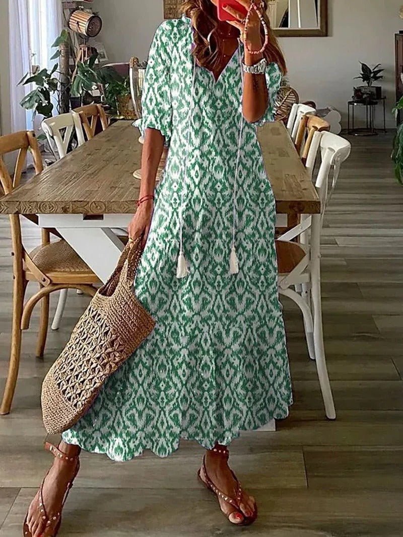 Robe longue boho beige Danoir Paris Lana, coupe flatteuse, style maxi avec motifs bohèmes, tissu léger et fluide.