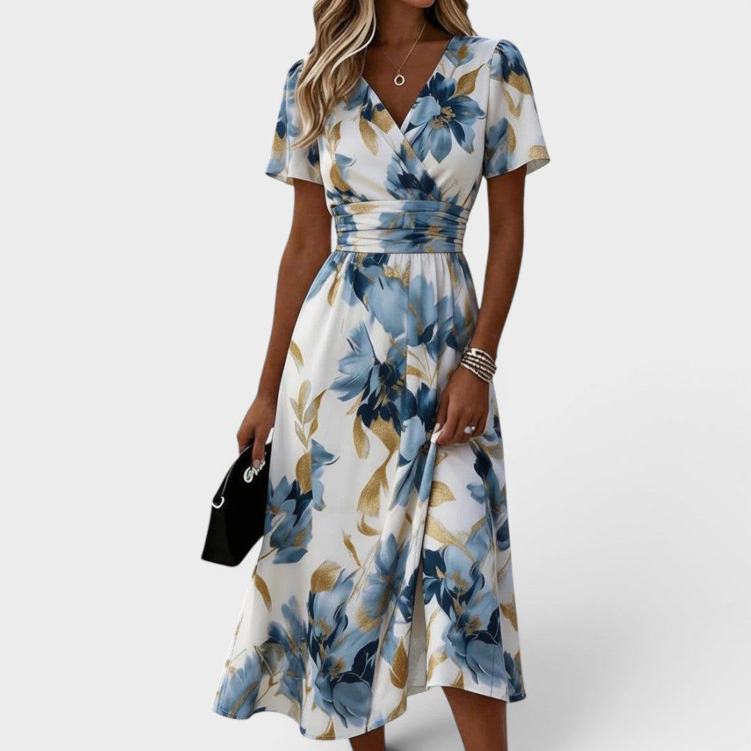 Robe midi à taille croisée Denise de Danoir Paris avec motif floral multicolore, idéale pour un style élégant et féminin.