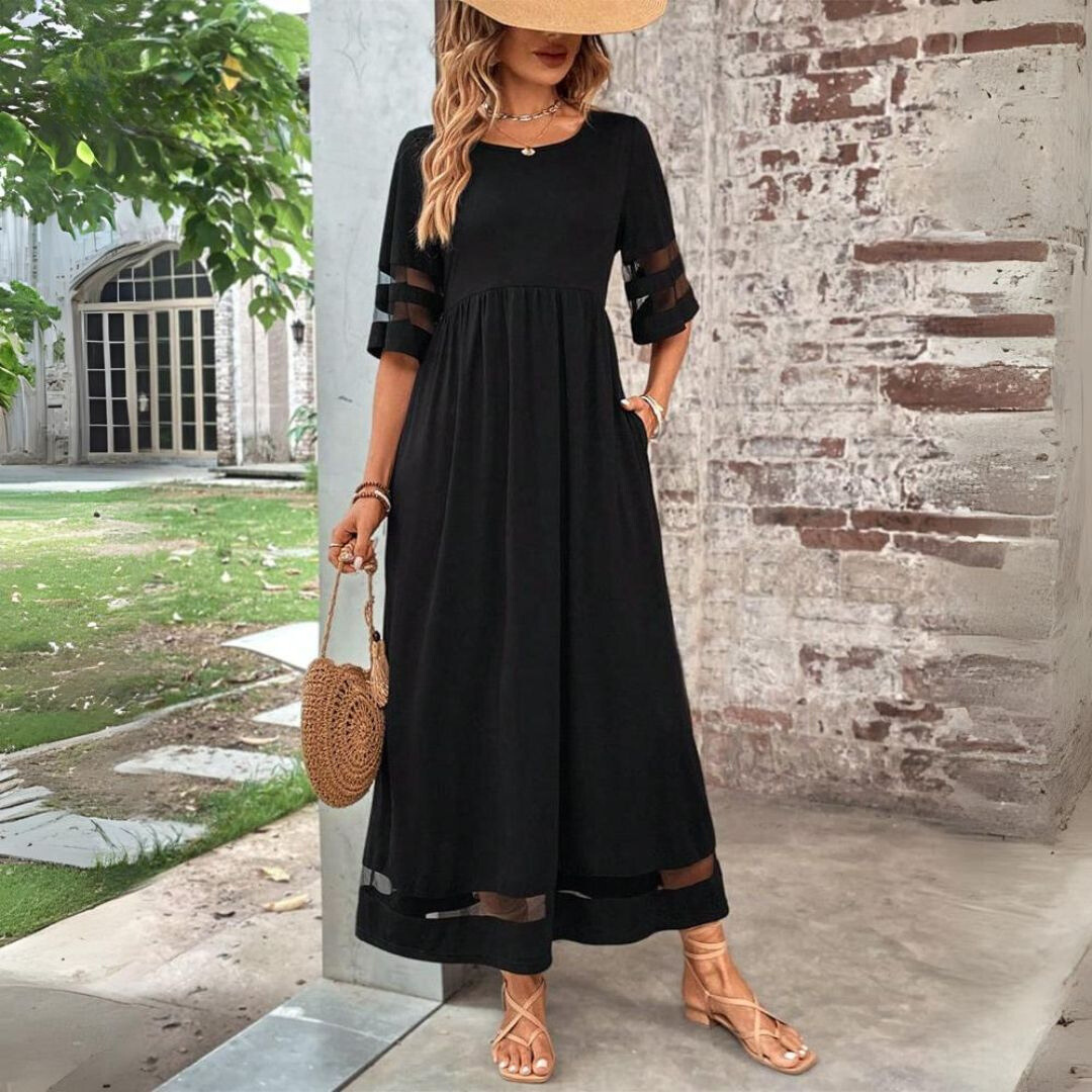 Robe midi noire Danoir Paris Aubrée, coupe flatteuse, tissu fluide et élégant, portée décontractée ou habillée.