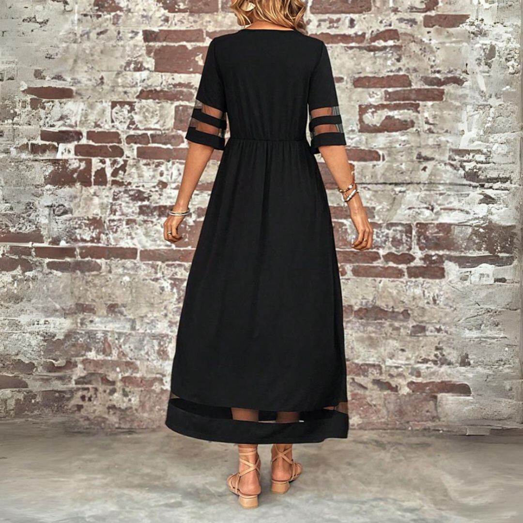 Robe midi noire Danoir Paris Aubrée, robe flatteuse en tissu léger, portée élégante et moderne.