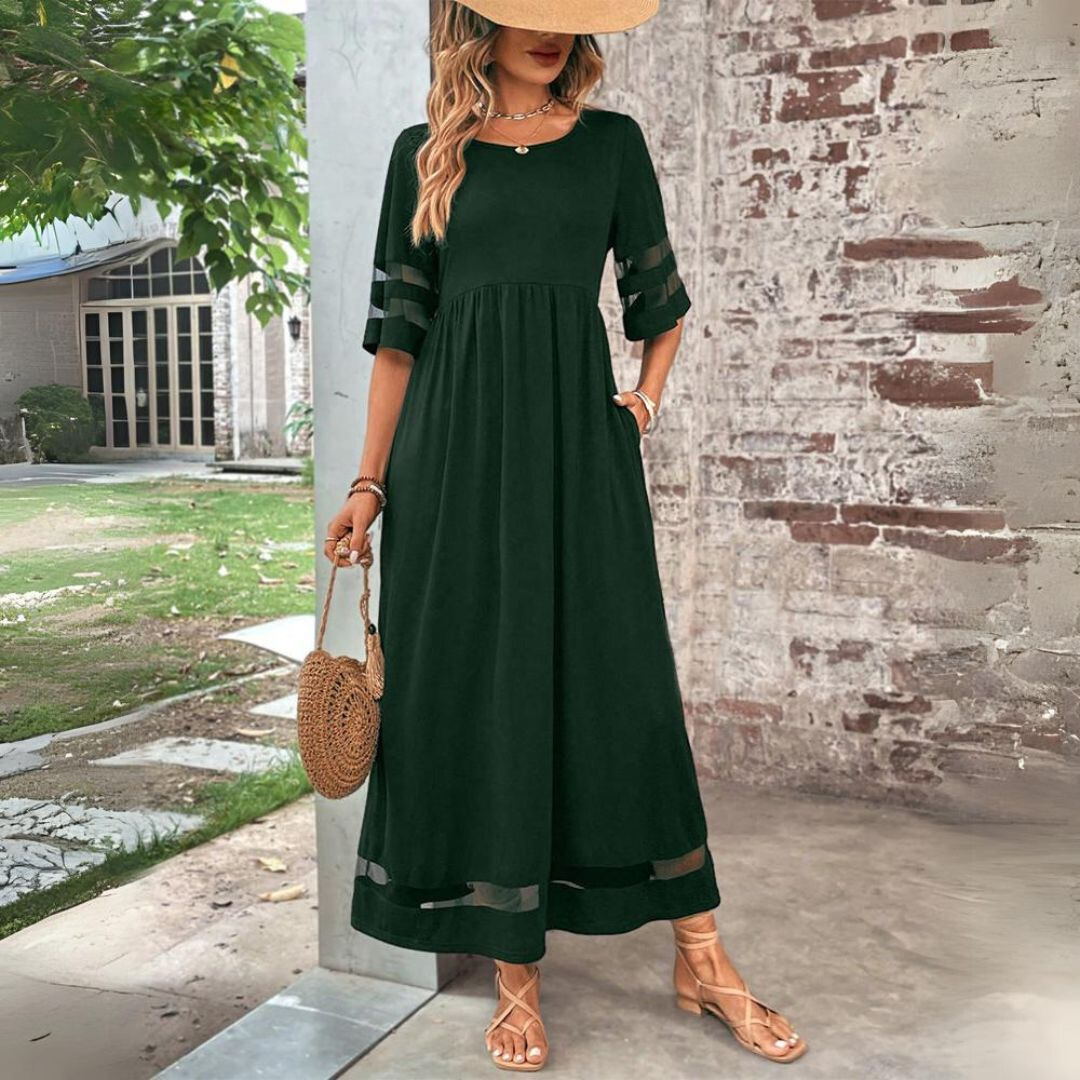 Robe midi noire Danoir Paris Aubrée, robe flatteuse en tissu fluide, portée élégante et tendance.