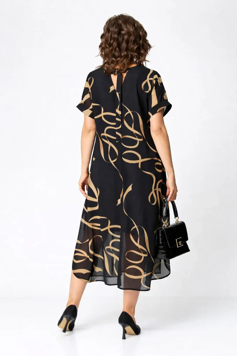 Robe élégante et confortable NORA de Danoir Paris, tissu doux avec coupe sophistiquée, idéale pour une tenue chic.