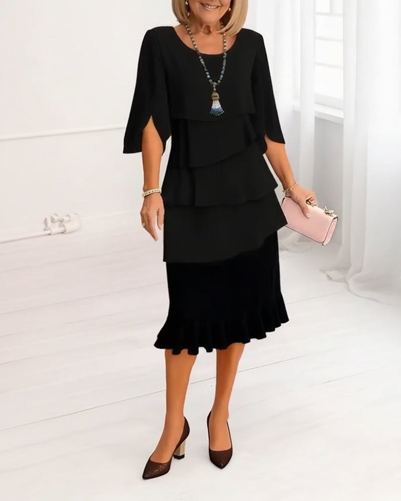 Robe fluide noire Sophie de Danoir Paris avec volants, élégante et légère, parfaite pour une tenue sophistiquée.