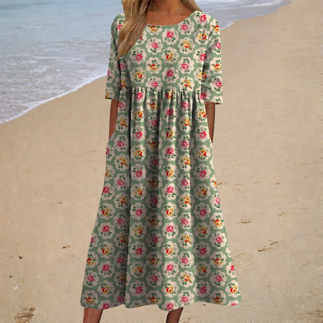 Robe midi romantique blanche Aurélie de Danoir Paris, élégante et fluide, parfaite pour une allure féminine et sophistiquée.