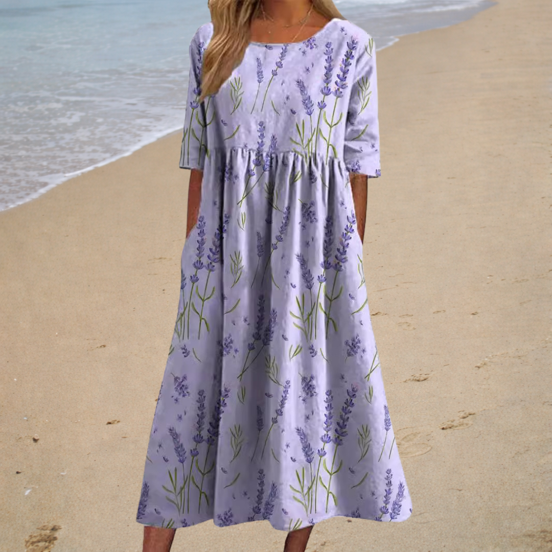 Robe midi romantique blanche Aurélie de Danoir Paris, élégante et fluide, pour une tenue féminine et sophistiquée.