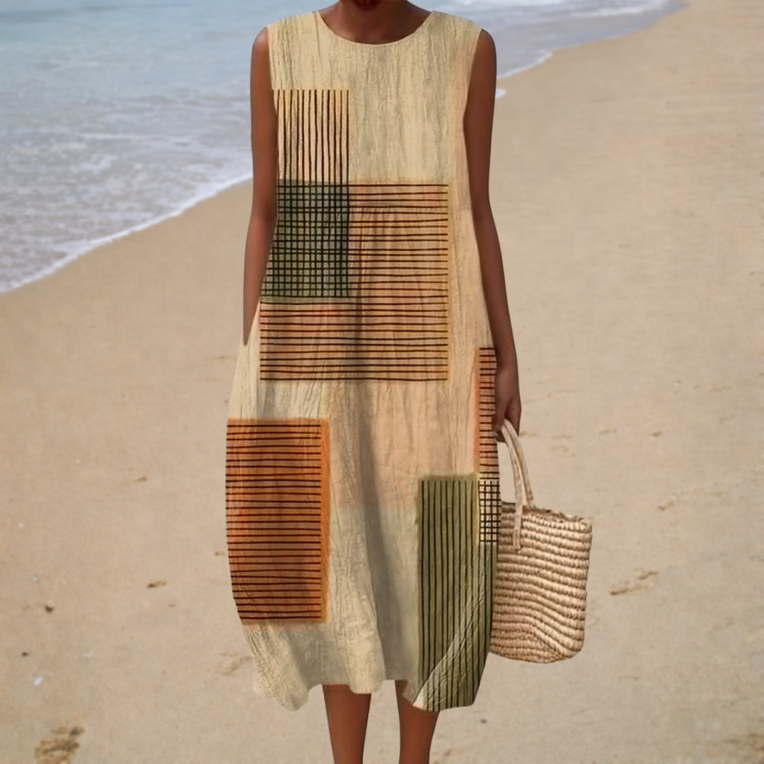 Robe midi graphique Aurélie de Danoir Paris, robe élégante à motifs modernes, portée pour une tenue chic et tendance.