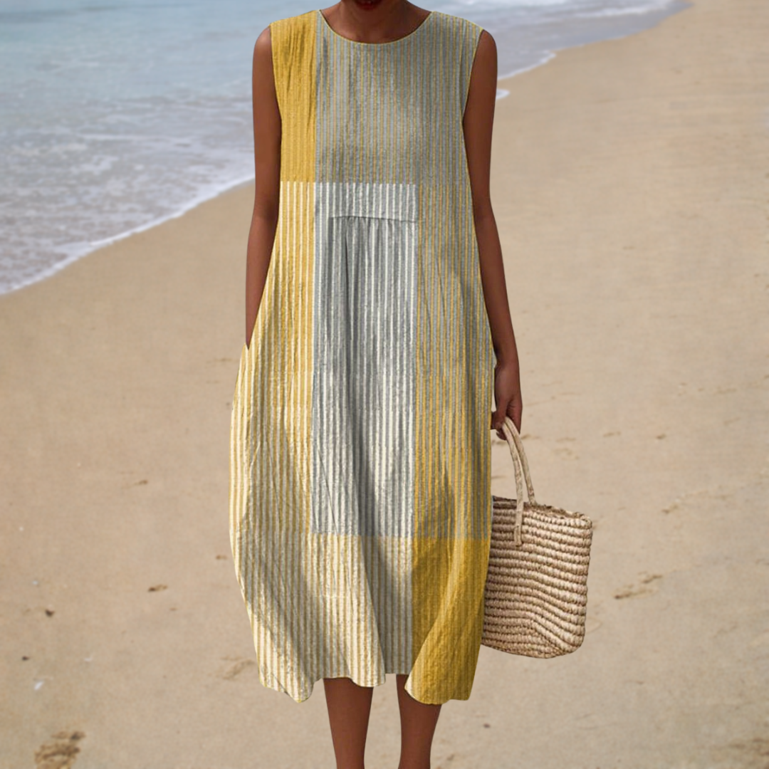 Robe midi moderne Clémence de Danoir Paris, vêtement élégant avec coupe tendance, portée en occasion spéciale ou décontractée.