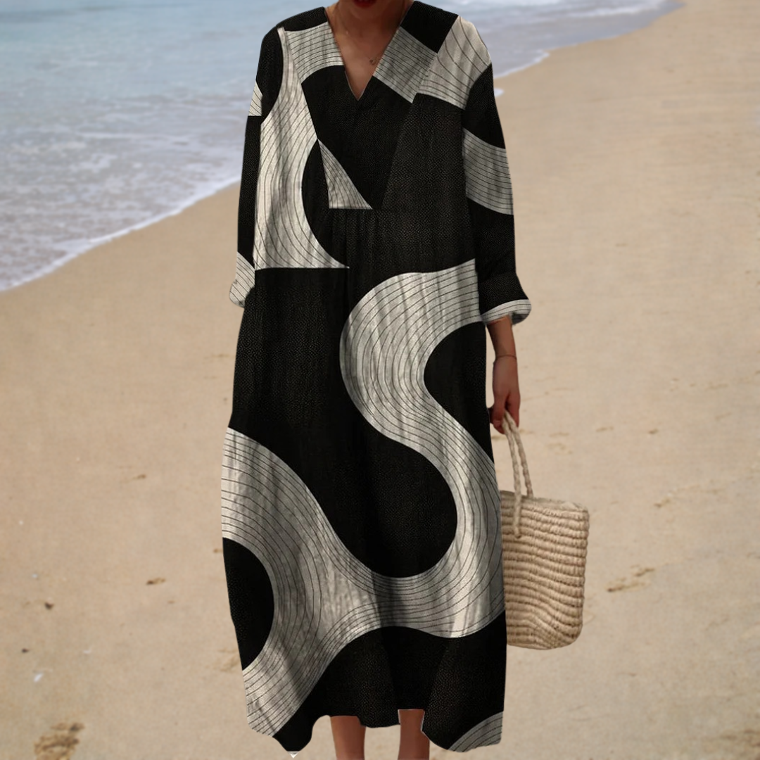 Robe longue graphique Isaline de Danoir Paris, vêtement élégant pour femmes, avec motif moderne et coupe fluide.